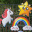 Einhorn, Stern und Regenbogen am Zaun